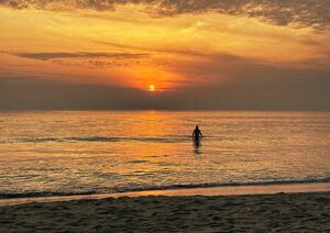 Golden sunset over calm